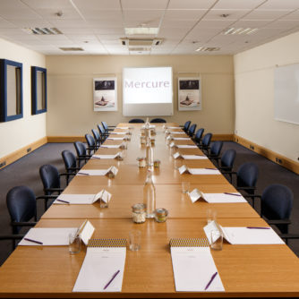 The Brunswick & Bramham meeting room, set up for a boardroom style meeting