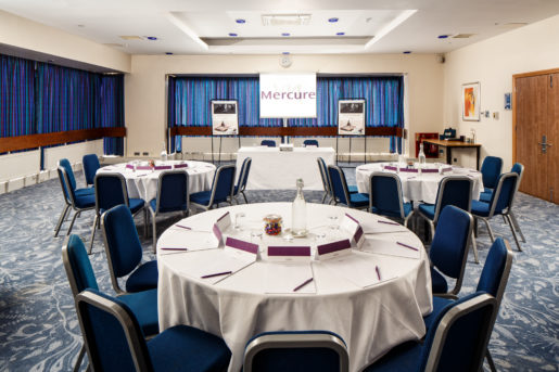 The Harewood meeting room set up for a meeting