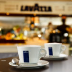 Two cups of coffee on table in Lavazza coffee shop cafe at Mercure Wetherby Hotel